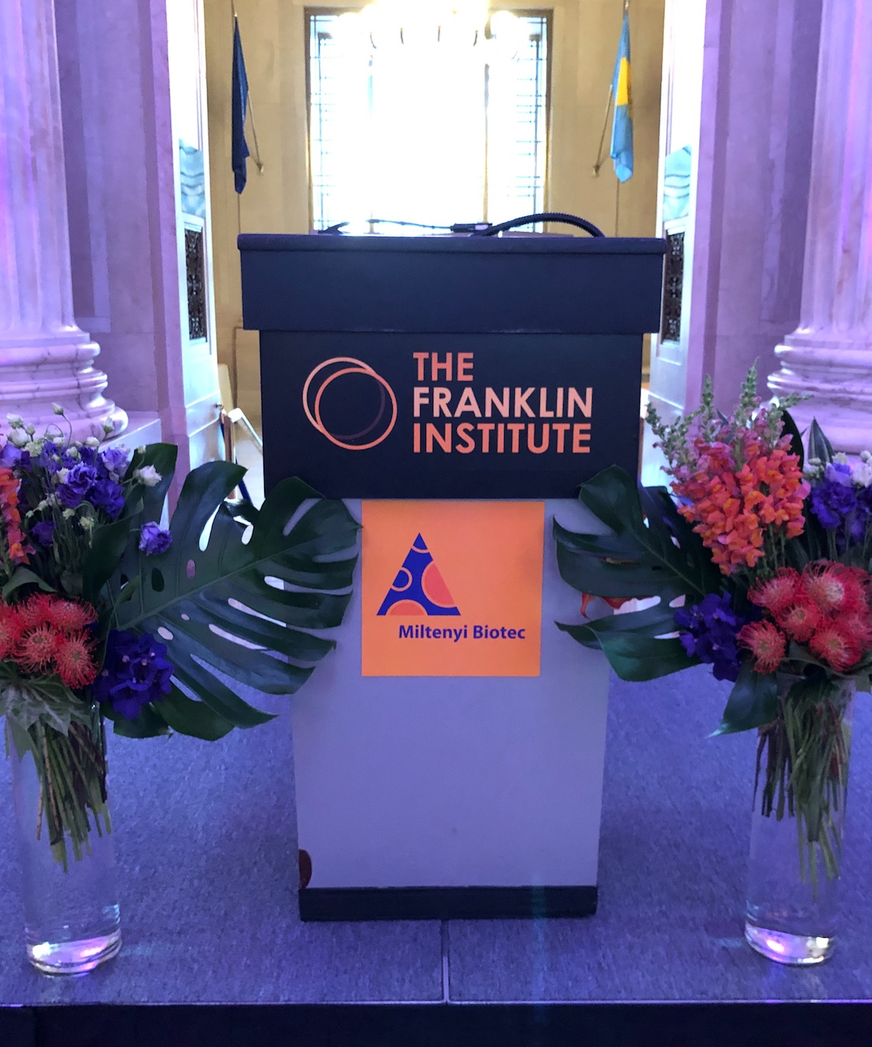 Podium signage at the Franklin Institute customer event