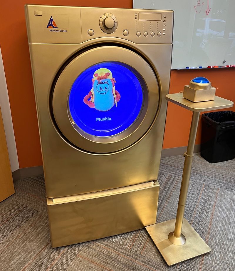 The Golden Washing Machine, studio view of the branded prize display